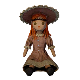 Doll Wearing Brown Bonnet